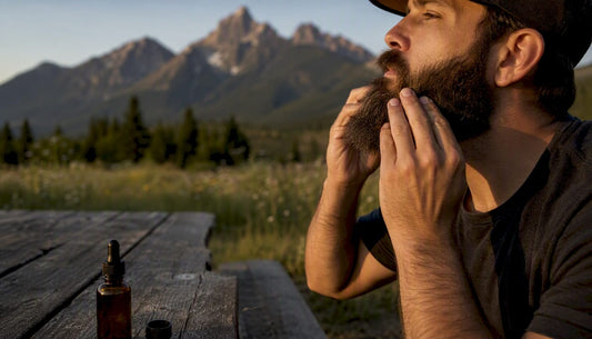 Man applying beard butter outdoors